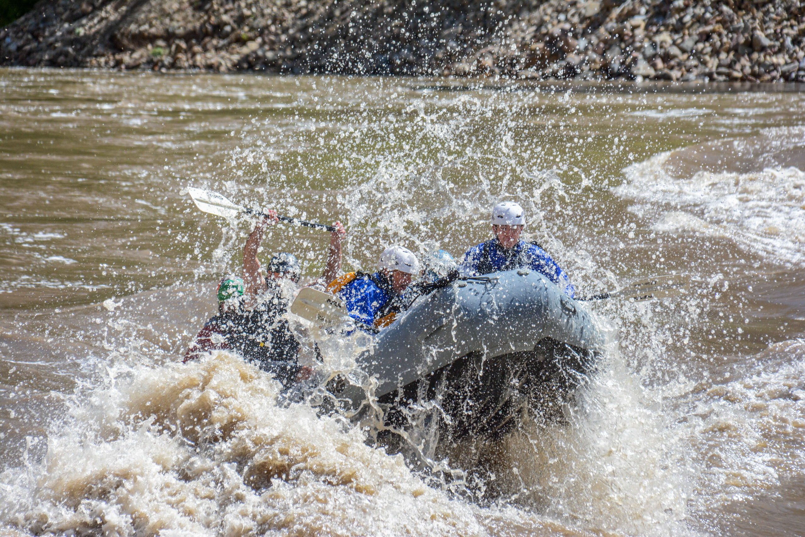 Boat flies above river during Shoshone Rapids Half-Day rafting trip