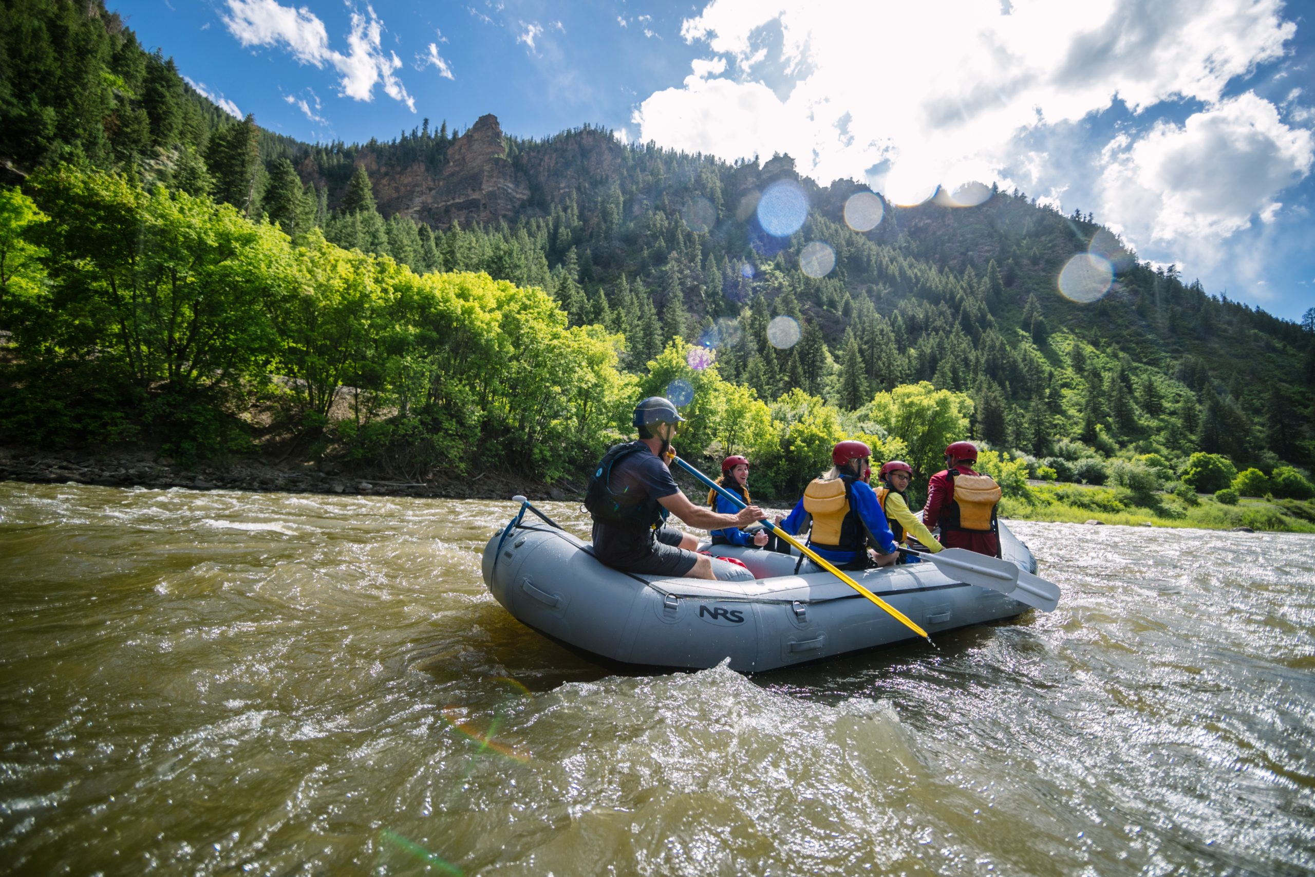 a group floats down the shoshone rapids