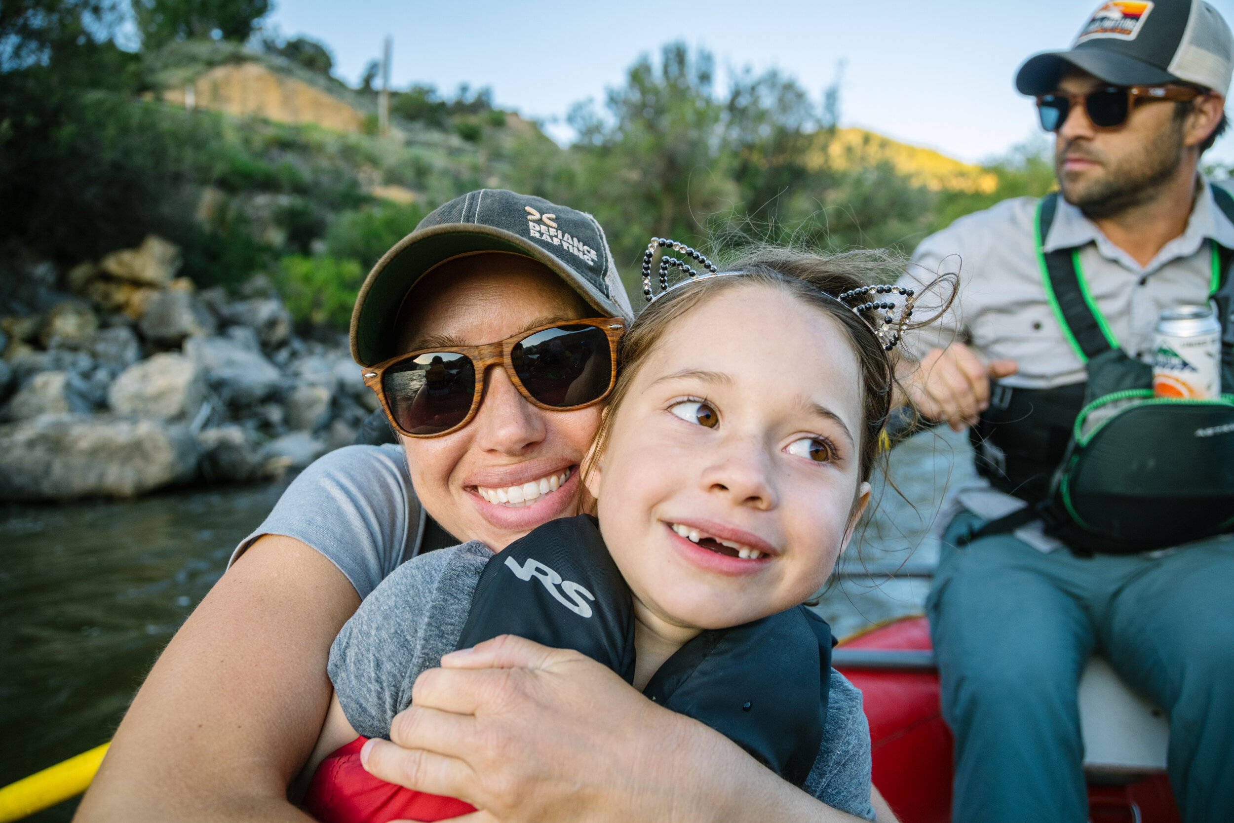 Defiance owners Heather, Gregory, and Elsie enjoying a late-afternoon float through Glenwood Canyon.